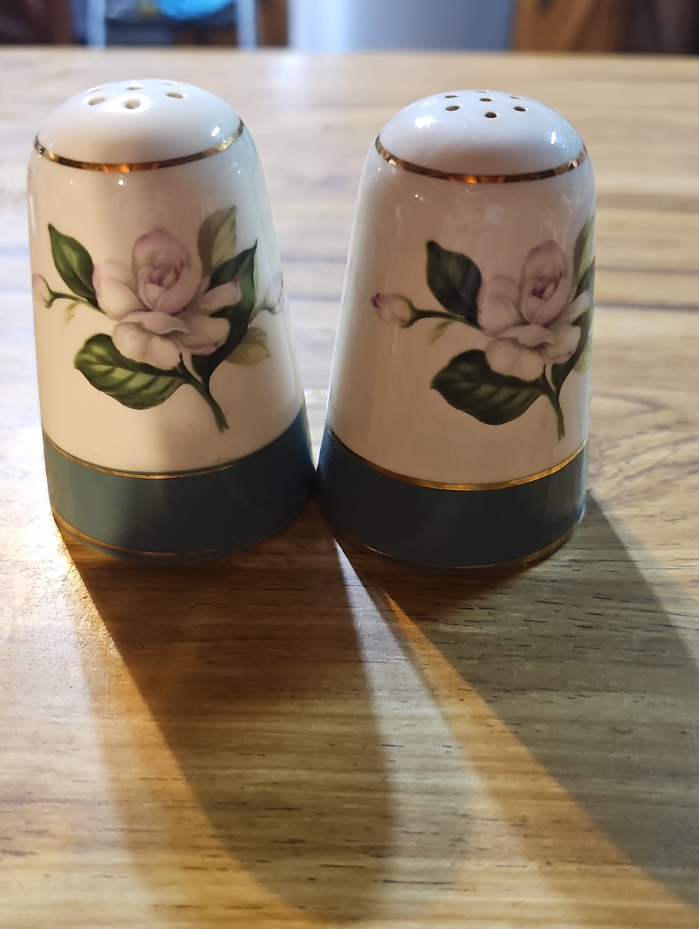 White Porcelain Floral Salt and Pepper Shakers with Gold Trim